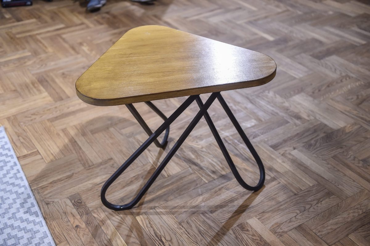 Triangular Coffee Table Wooden with Metal Knockout Legs at Adidas Runners Club