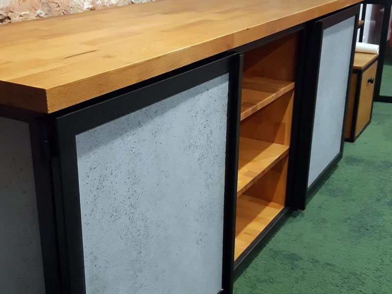 Cabinet doors in Chest of Drawers made of glass-fibre-reinforced structural concrete based on a metal frame